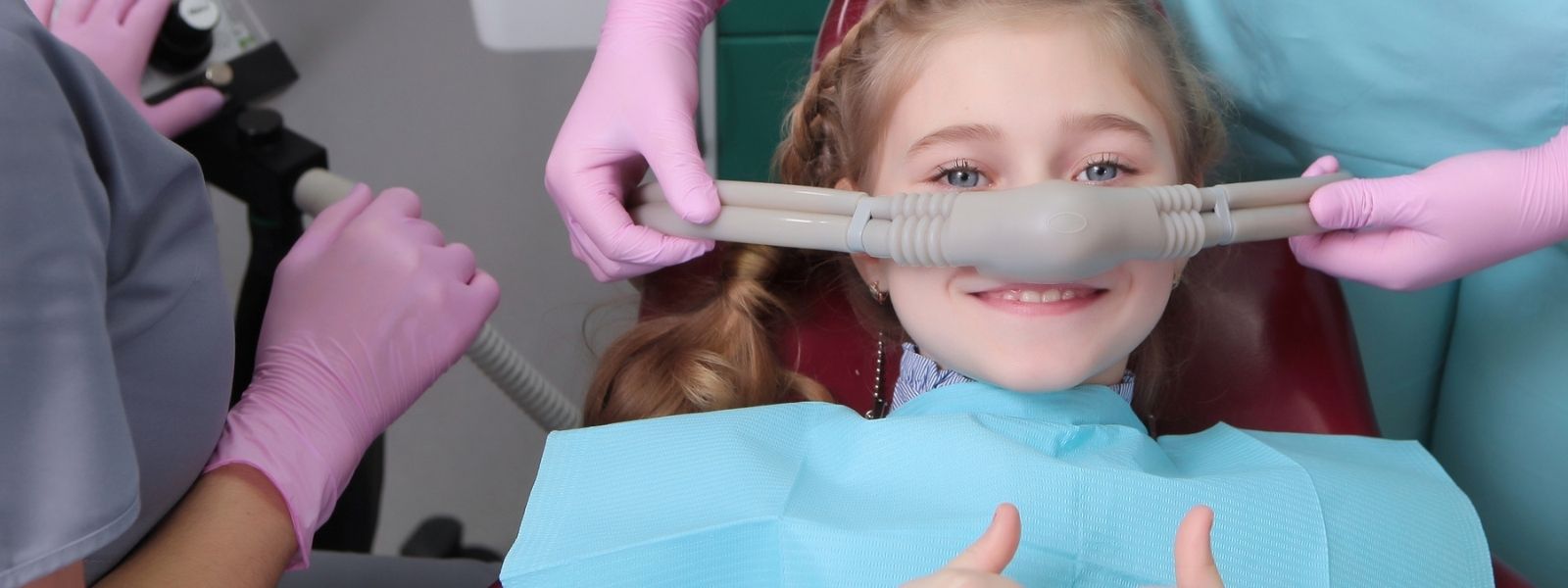 Young girl getting sedate at Dental